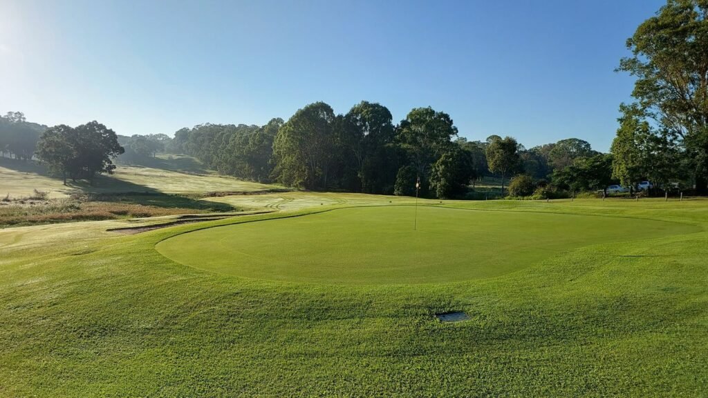 Pine Rivers Golf Club sloping fairway and green — Kurwongbah, QLD