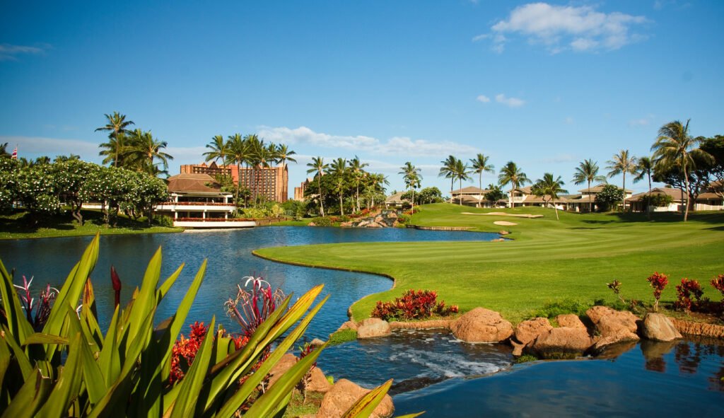 Ko Olina Golf Club 18th hole with lake and resort - Kapolei, Hawaii