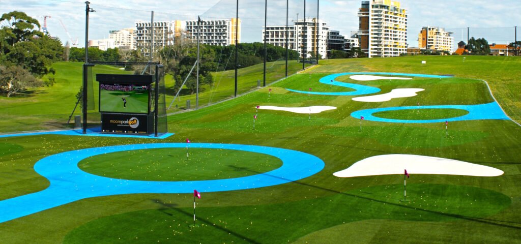 TrackMan driving range bays and city screen at Moore Park Golf