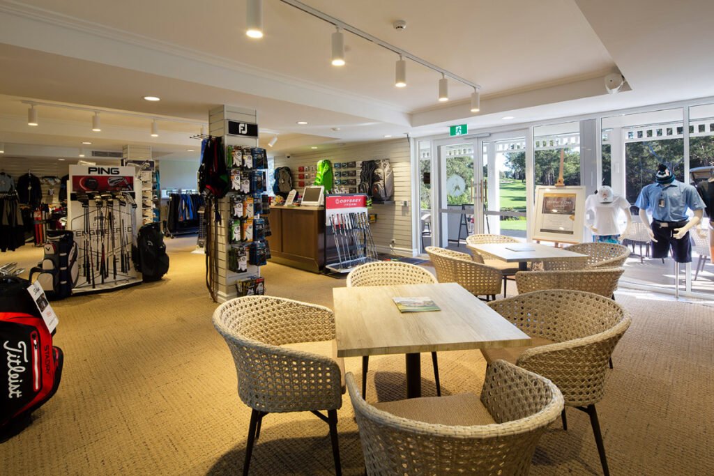 Golf equipment and cafe seating inside the Pennant Hills Pro Shop