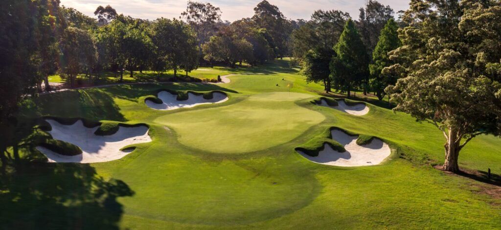 Third green surrounded by sculpted bunkers at Pymble Golf Club