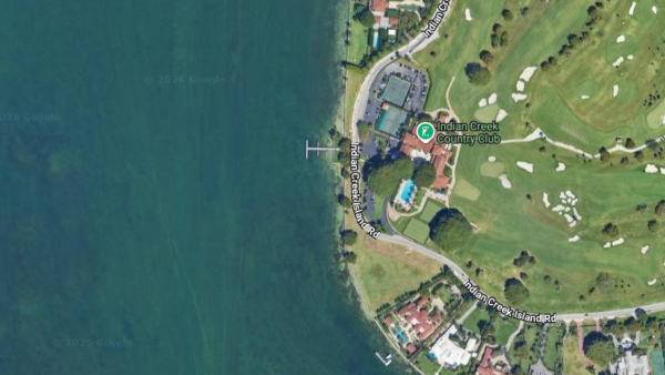 Indian Creek Country Club clubhouse, pool and golf course - Indian Creek Village, Florida