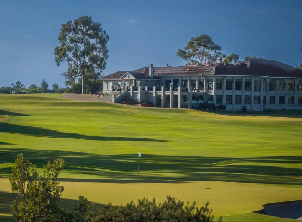 Commonwealth Golf Club clubhouse exterior beyond the green — Oakleigh South, Victoria