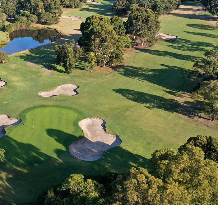 Keysborough Golf Club 4th hole with water and bunkers — Keysborough, Victoria