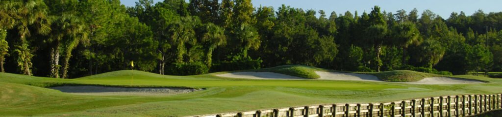 Westchase Golf Club course panorama with bunkers and wooden fence — Tampa, Florida